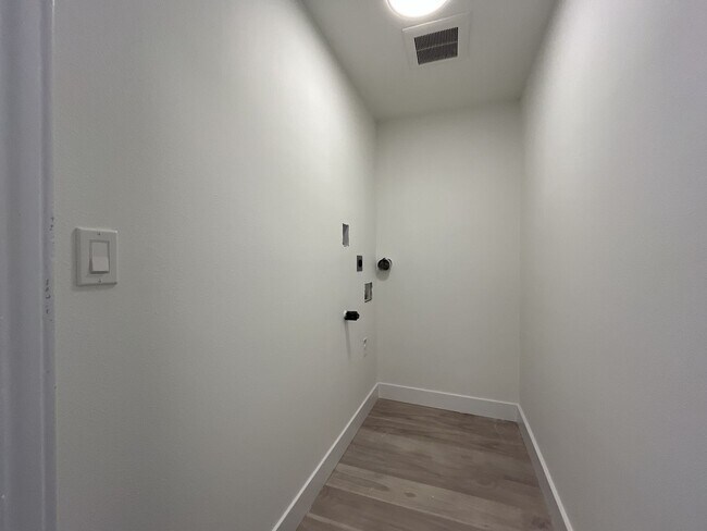 Building Photo - Expansive 4BR 2,900+ Sq Ft Home with Theater-Style Living Room & Bonus Hobby Workshop