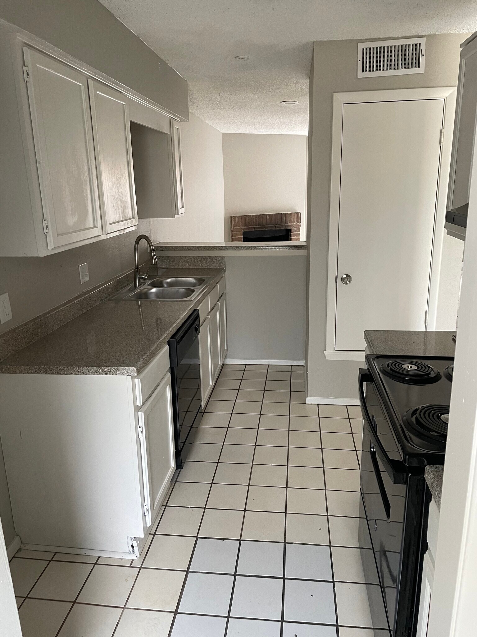 Kitchen (view from wash room) - 8110 Foxfire Ln
