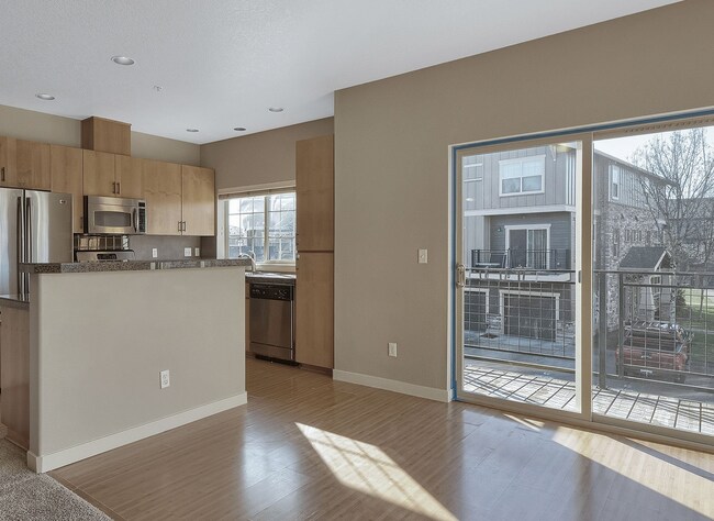 Building Photo - 2BR + 2.1BA Corner Townhome-Style Condo — Dual Primary Suites, Attached Garage & Most Utilities I...