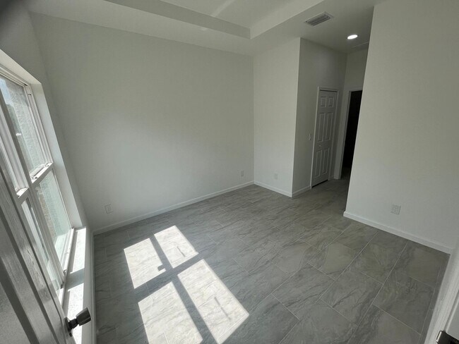 Building Photo - MODERN BRAND NEW RETREAT IN LEHIGH ACRES!