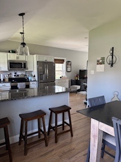 Kitchen looking towards additional sitting room leading to outdoor deck/patio - 14 Kalina Dr