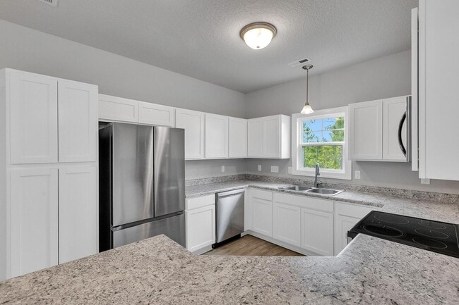 Building Photo - Modern 2-Story Townhome with Garage
