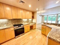 Building Photo - Top-Floor 2-Bedroom, 2-Bathroom Condo in t...