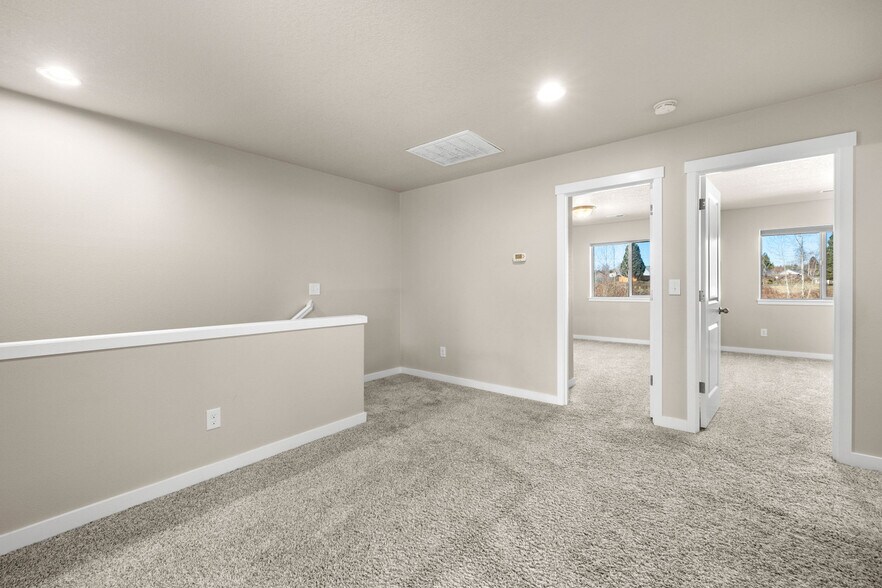 Landing on the 2nd floor looking into bedrooms 1 and 2 - 108 NE 14th St