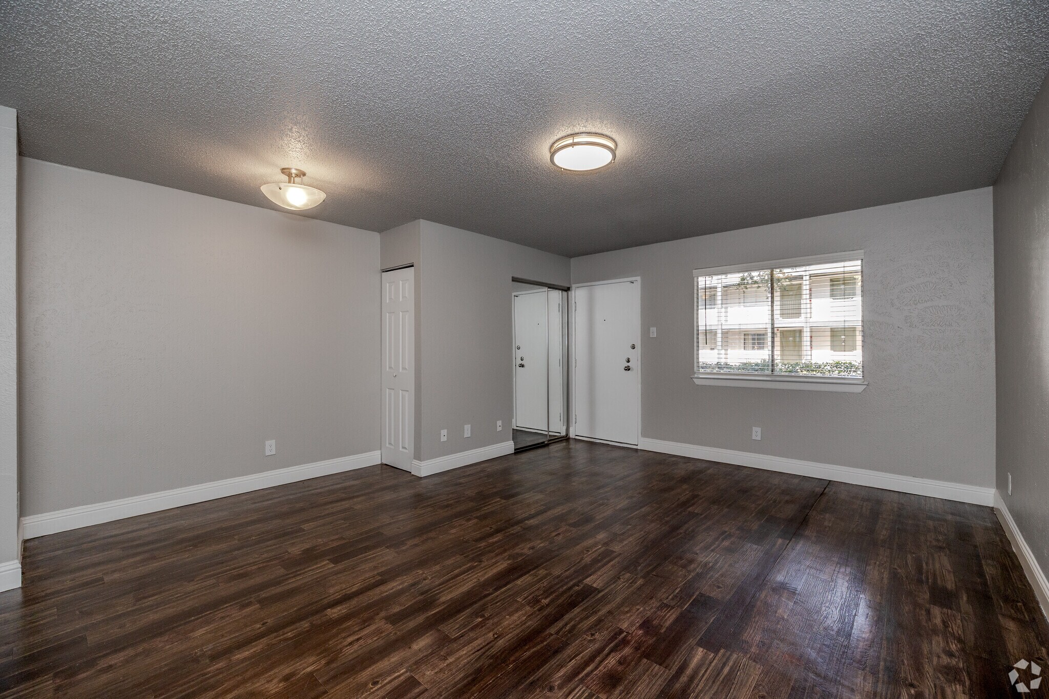 1BR, 1BA - A3R - Living Area - Riverfalls at Bellmar