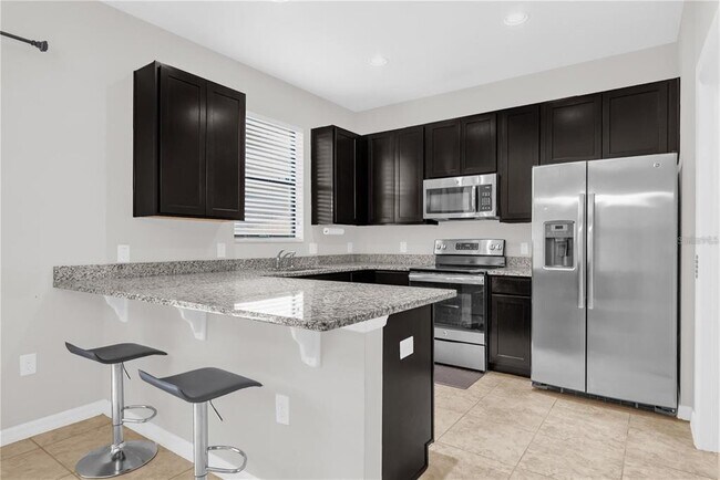 Building Photo - 2480 Seven Oaks Dr