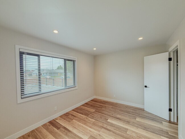 Building Photo - Modern 3-Bedroom Home with Private Yard in...