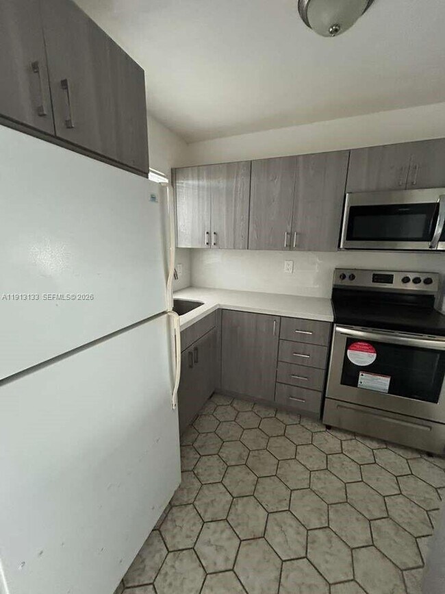 Building Photo - 8460 Sunrise Lakes Blvd