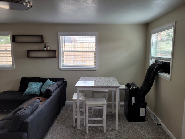 Breakfast area with movable AC unit - 1550 Oak Ct