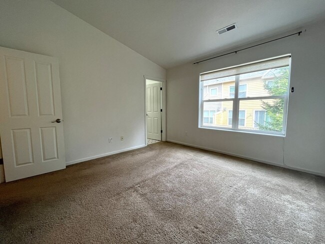 Building Photo - Beautiful 2 Bedroom Townhome with Walk-In Closets Private Deck & Attached Garage