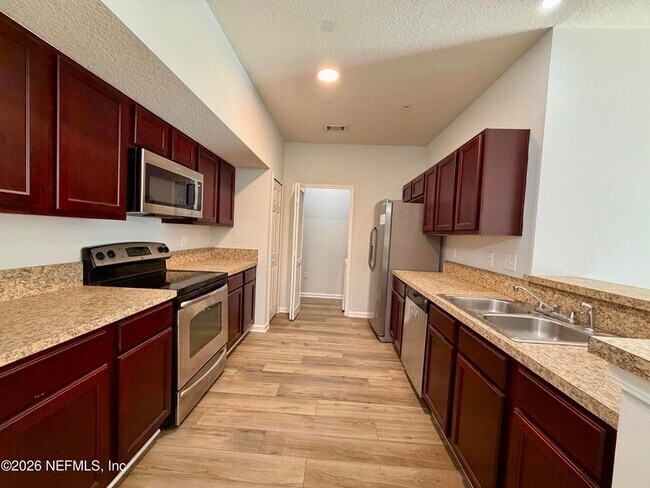 Building Photo - 6916 Ortega Woods Dr