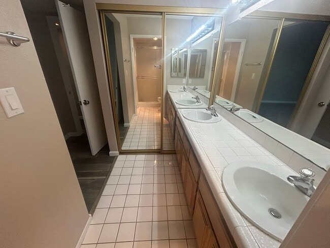 Building Photo - Upper-Level Condo – Bright, Stylish, and Ideally Located!