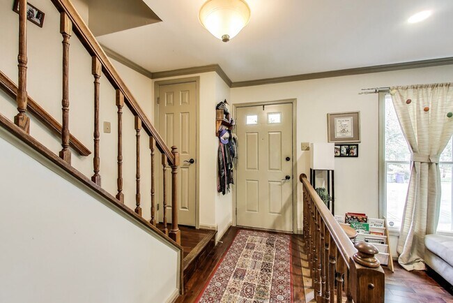 Building Photo - COMINGS SOON - Beautifully Updated Winchester-Built Townhome Backing to Serene Parkland.