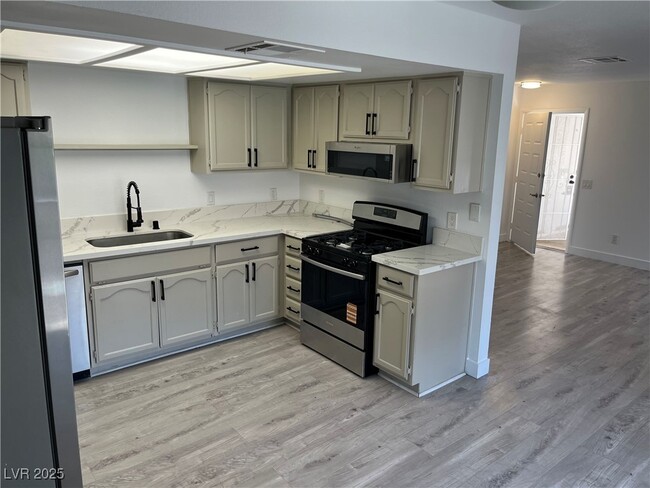 Building Photo - 6645 W Tropicana Ave
