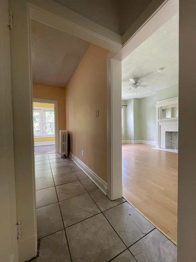 2nd floor view of living room, kitchen, and sunroom - 5859 Nicholson St