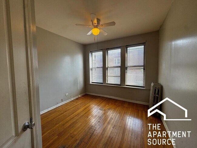Building Photo - 7654 S Marquette Ave