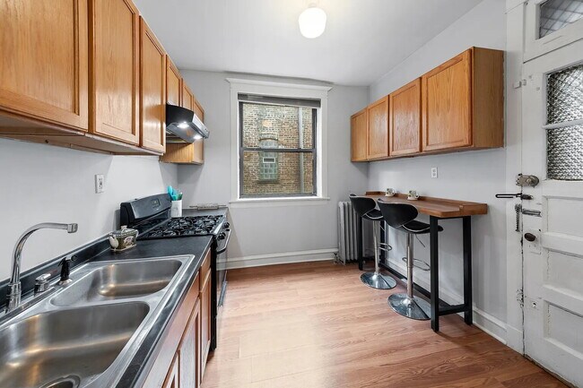 Building Photo - Premium Unit with Modern Upgrades