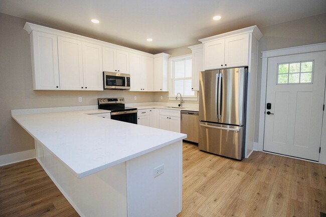 Building Photo - "Welcome to Olympia – Brand New Units! Spe...