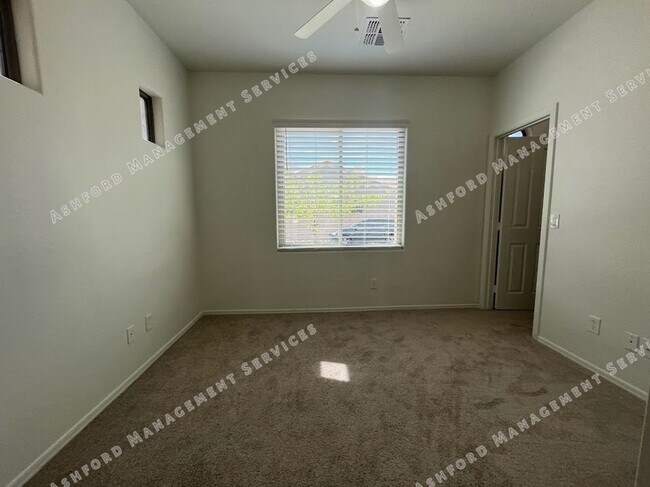 Building Photo - Well-Priced 3-Bedroom Plus Den in Gated Ru...