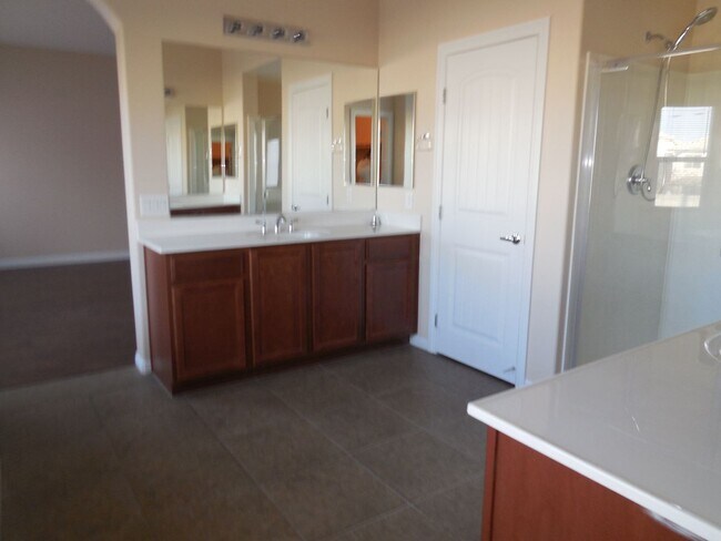 Building Photo - Spacious House w/Tons of Storage,Tile & Wo...