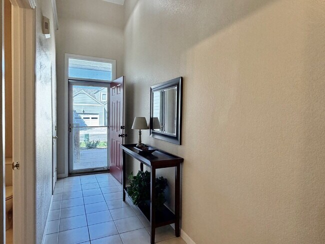 Building Photo - Lakeside 3 Bed/2.5 Bath Townhome in Gateway Community! Quiet, Scenic Living in The Heart Of Denver!