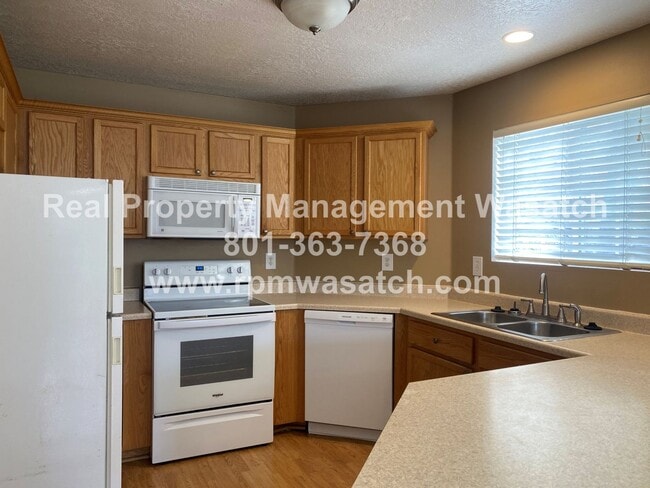 Building Photo - Check Out This Amazing 3 Bedroom 2 Bathroom Condo In Riverton