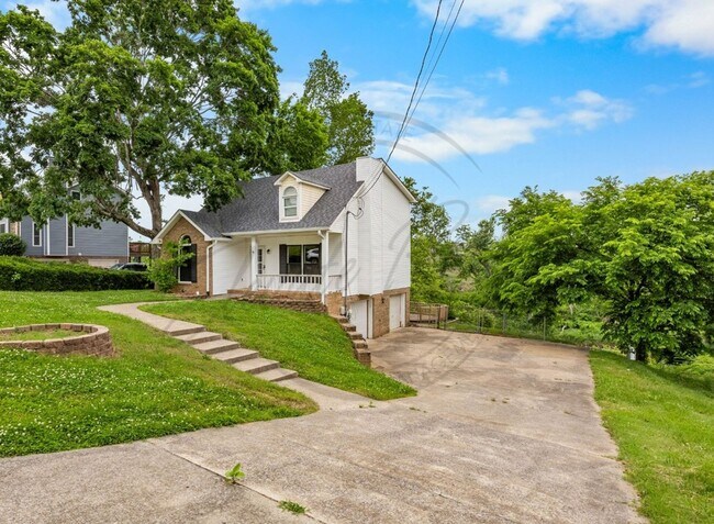Building Photo - Four Bedroom Two Story with Two Car Garage...