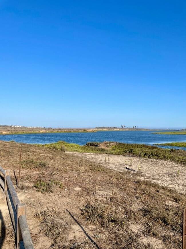 Building Photo - Welcome to Coastal Living at Its Finest!