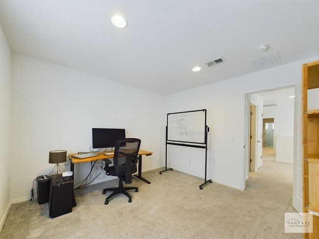 Building Photo - Two Level Pulte Townhouse Available Soon!