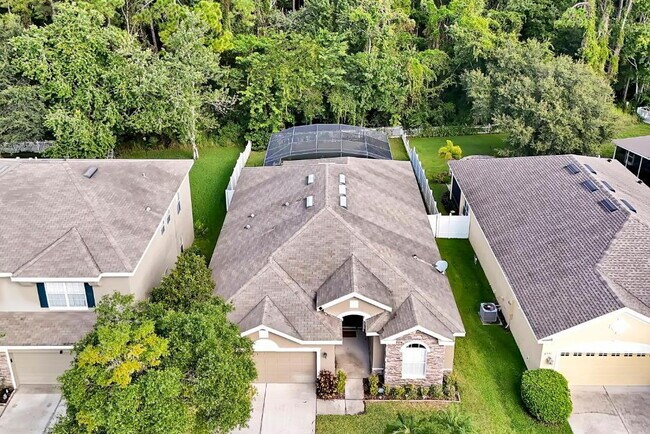 Building Photo - "Stunning 3BR Orlando Home with Private Screened Pool, Spa & Spacious Living Areas"