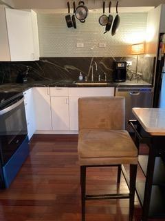 Building Photo - 155 World of Tennis Sq