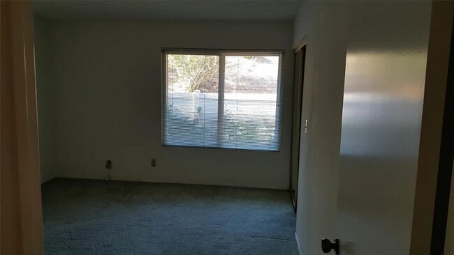 Building Photo - Available Now is a Condo style Townhouse i...