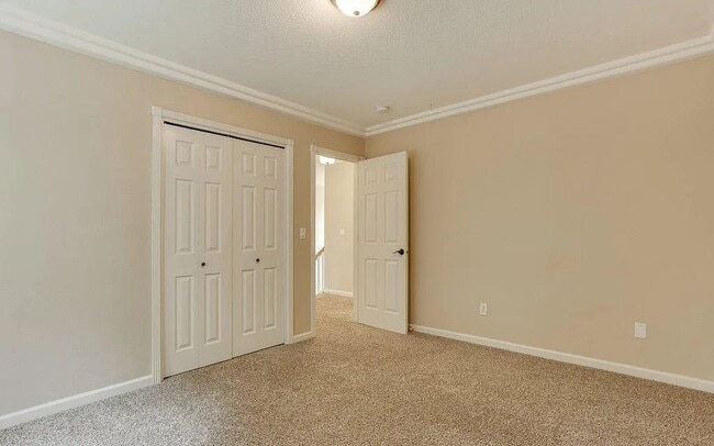 Building Photo - Spacious Four-Bedroom Home with Gourmet Kitchen, Multiple Living Areas, Loft, and Beautifully Lan...