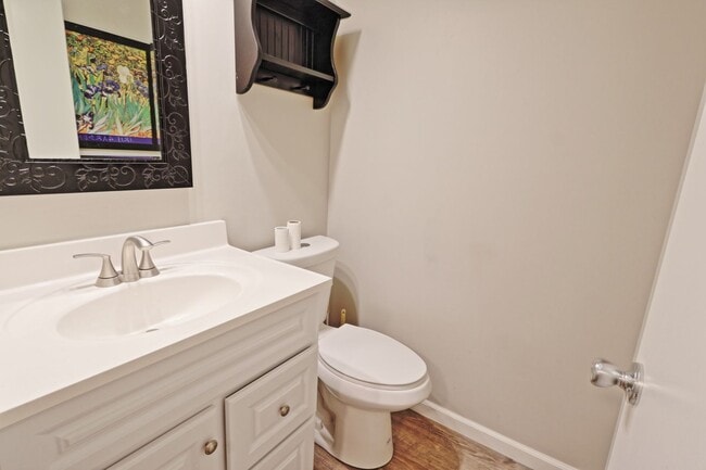Building Photo - Spacious 3-Bedroom Condo with Finished Basement & Private Fenced Yard!