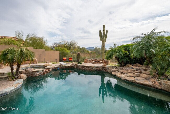 Building Photo - 7895 E Softwind Dr