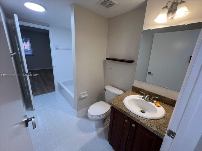 Building Photo - 3261 Sabal Palm Manor