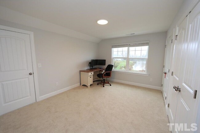 Building Photo - Main Floor Owner's Suite PLUS Main Floor G...
