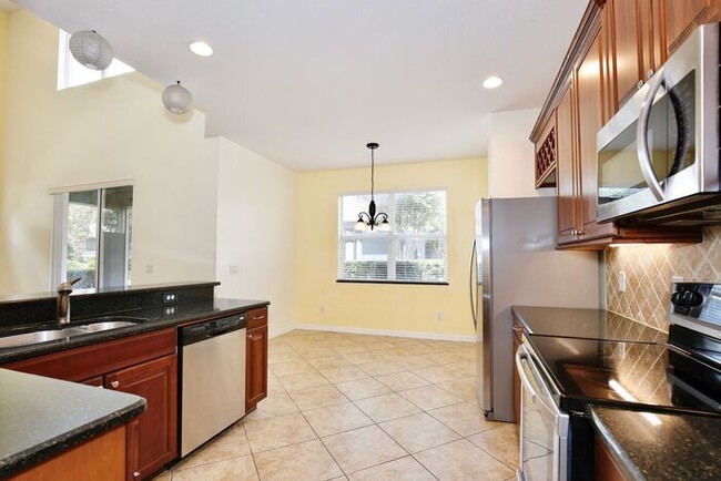 Building Photo - Elegant 3/3 Spacious Townhome with a 2 Car...