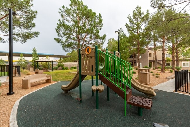 Building Photo - Spanish Palms a Guard Gated Community