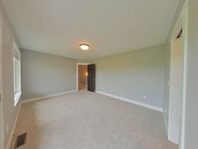 Building Photo - Stunning 3-bedroom, 2.5-bathroom condo with attached 2 stall garage!