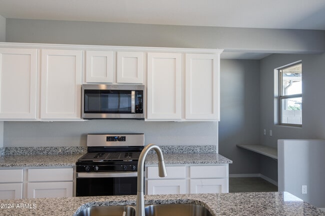 Building Photo - 8956 W Luke Ave