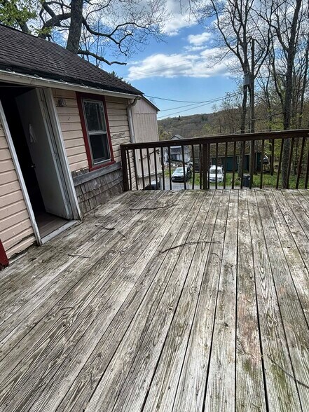 Outside deck. One of the two entrances of the home - 36 Maple Trl