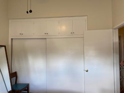 Bedroom 2 is large with wall closet and overhead storage. - 14333 Albers St