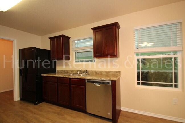 Building Photo - Beautiful 4-Bedroom, 2-Bath Home for Rent ...