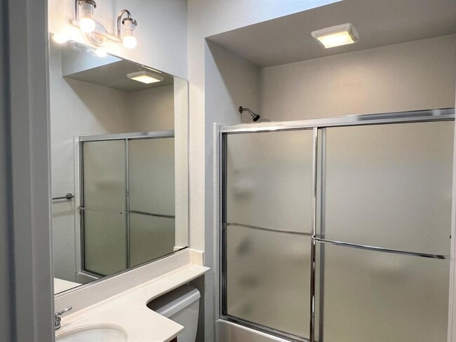 Building Photo - Spacious 2BR/2BA Redwood Shores Condo with Balcony, Natural Light & Garage Parking
