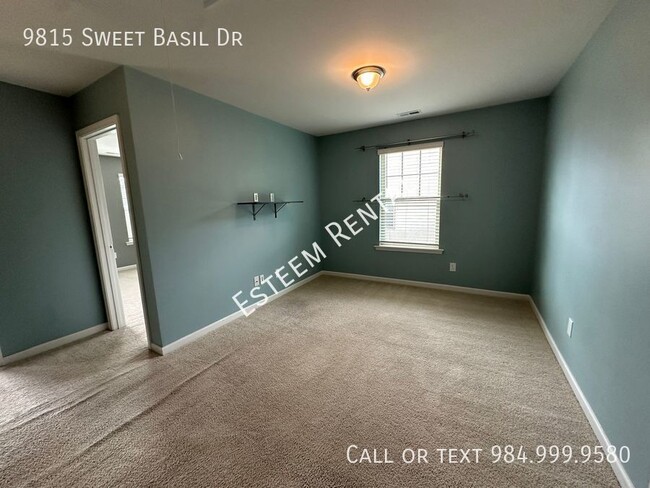 Building Photo - 9815 Sweet Basil Dr