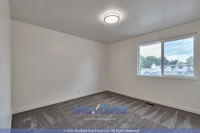 Building Photo - Millcreek Area Newly Updated - 4BD 2 BA 2GAR