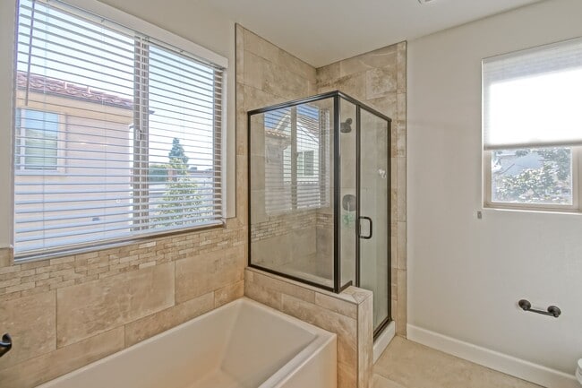 Building Photo - BUILT IN 2019: SPACIOUS & BRIGHT, DETACHED TOWNHOUSE W/ 2-CAR GARAGE & FENCED YARD IN GREAT RESID...