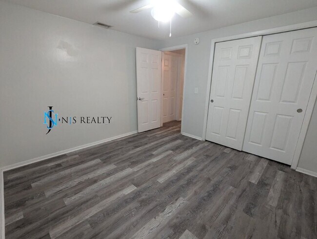 Building Photo - REDUCED!! NEW FLOORS, NEW PAINT INSIDE & O...