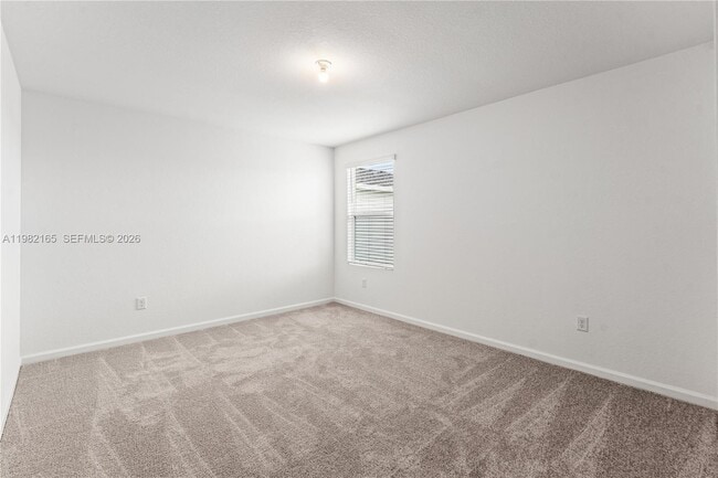 Building Photo - 10722 NW Moon Rise Ln